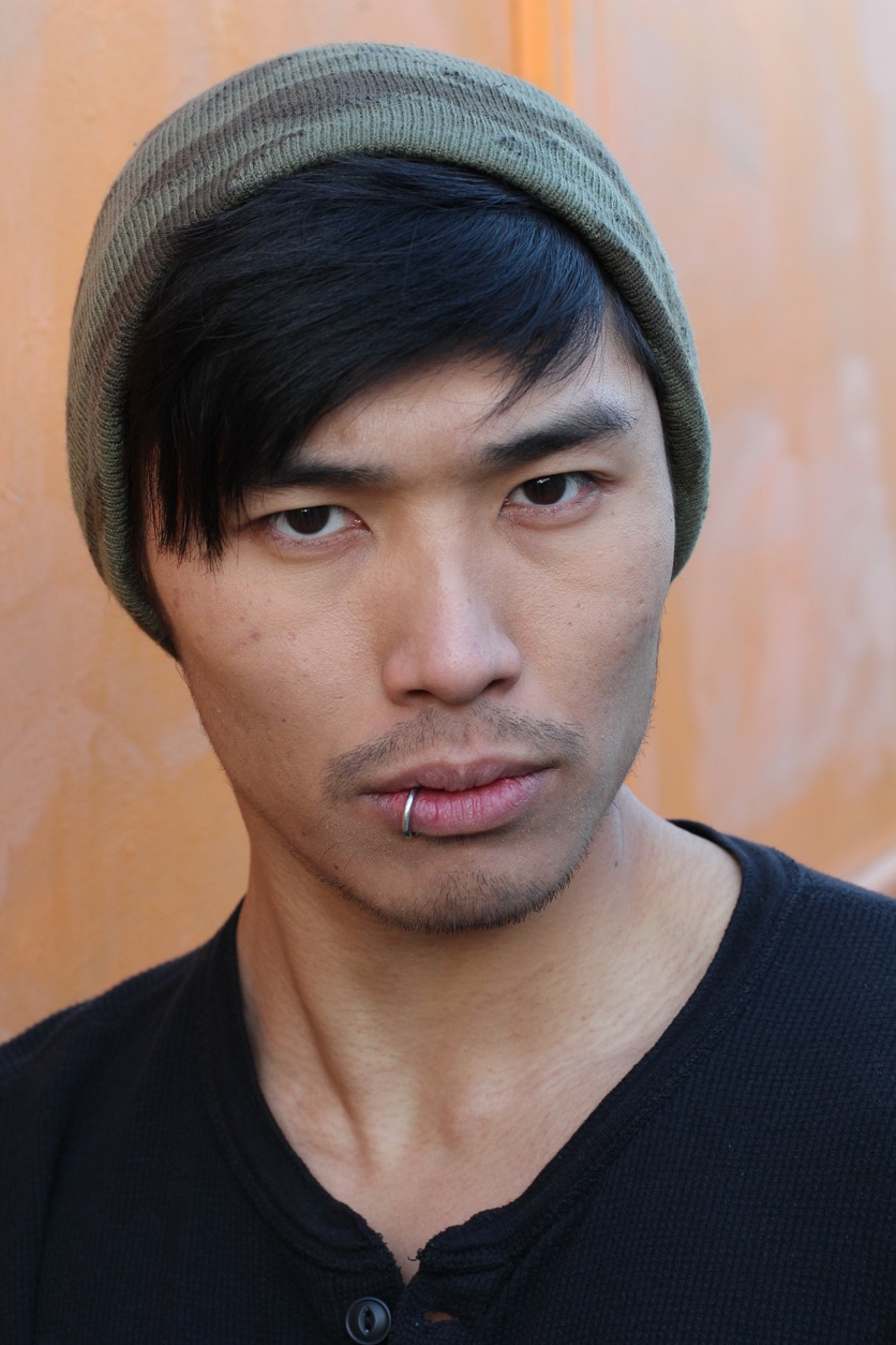 male with lip Piercing