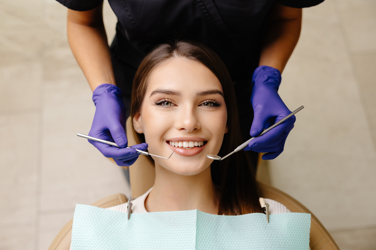Happy patient during a visit to the dentist