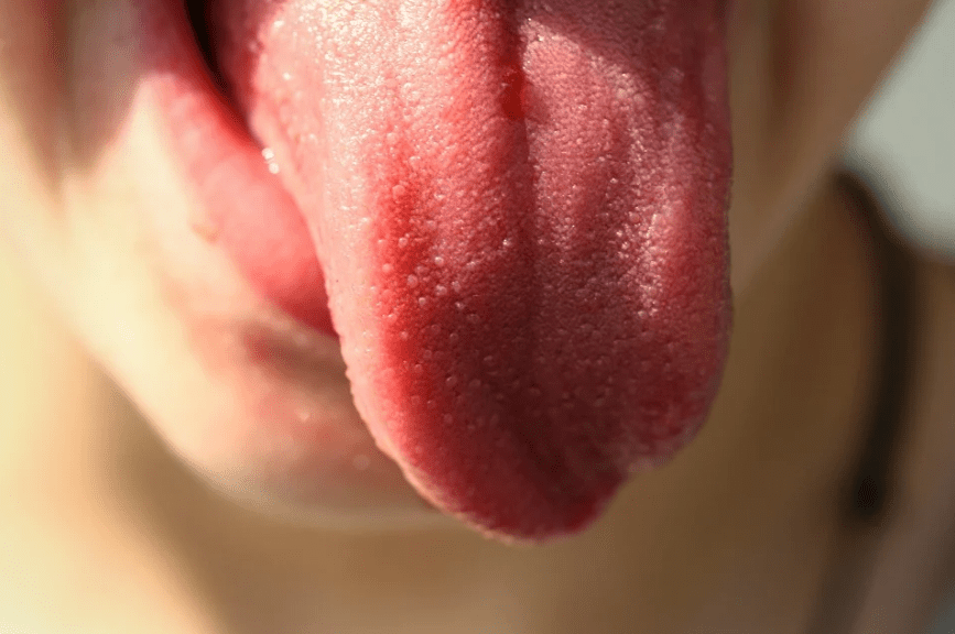 Image showing a child sticking out their tongue