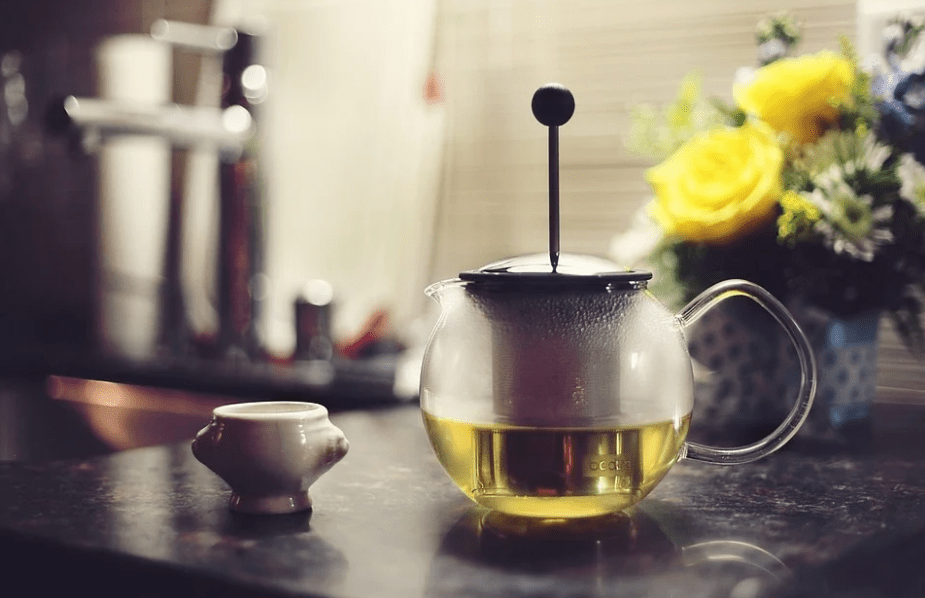 a round pot of green tea