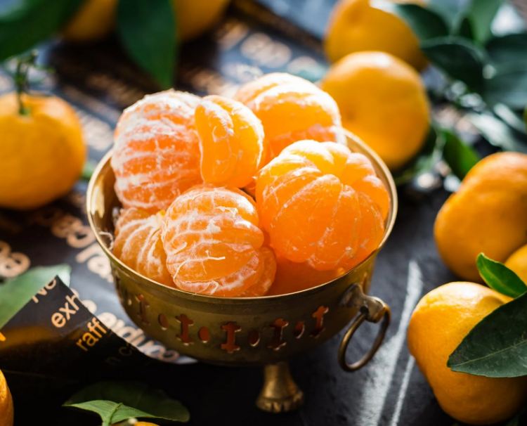 Image showing peeled oranges in a bowl. 