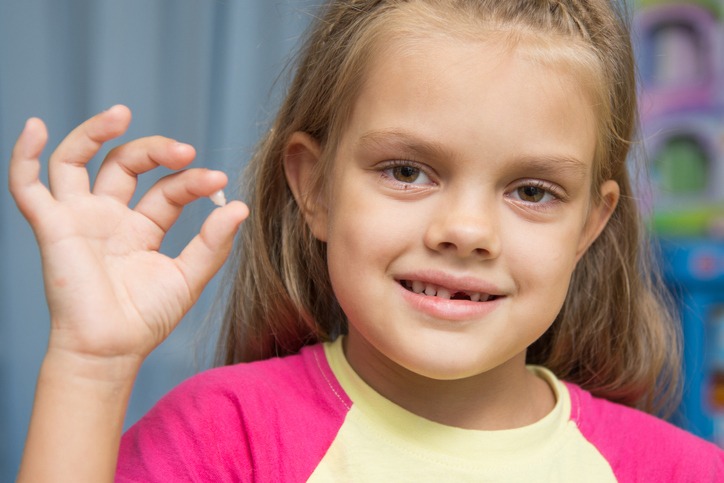 At five year old girl fell upper front baby tooth