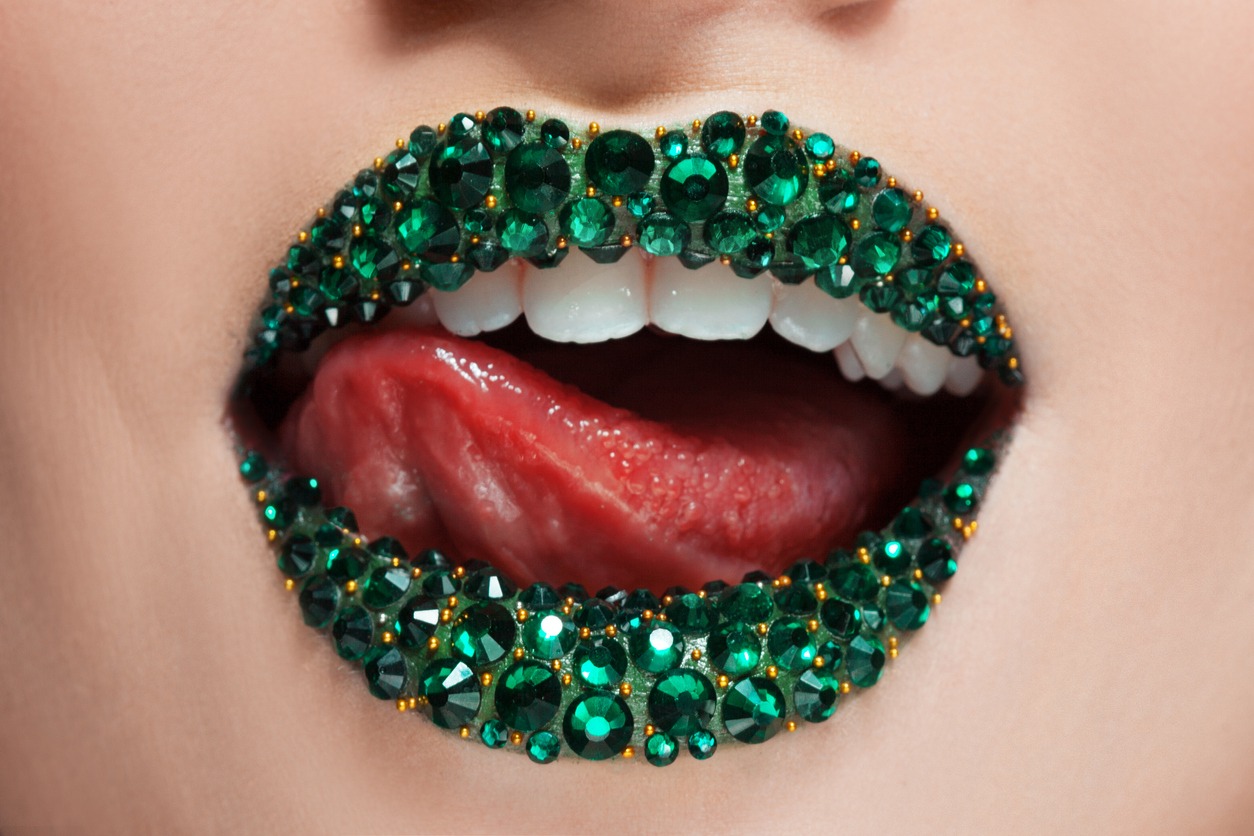 Green lips covered with rhinestones