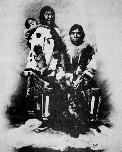 Chukchi family and their husky dog
